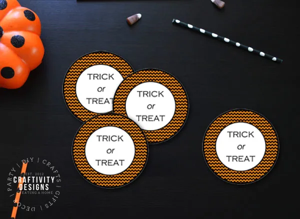 circle tags with the phrase "trick or treat"