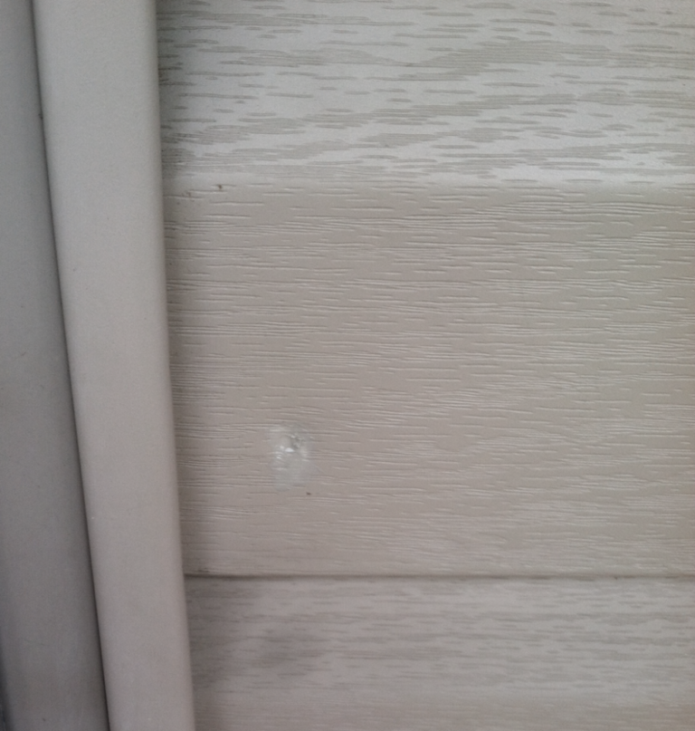 How to Repair a Hole in Vinyl Siding