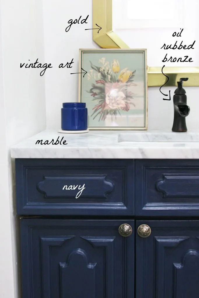 Plan for Bathroom includes navy cabinetry, marble counters, gold and oil-rubbed bronze finishes and grey ceramic floor tile. by @Craftivity