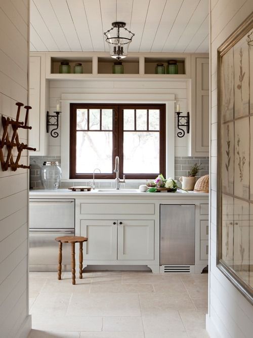 dark wood window trim in white kitchen
