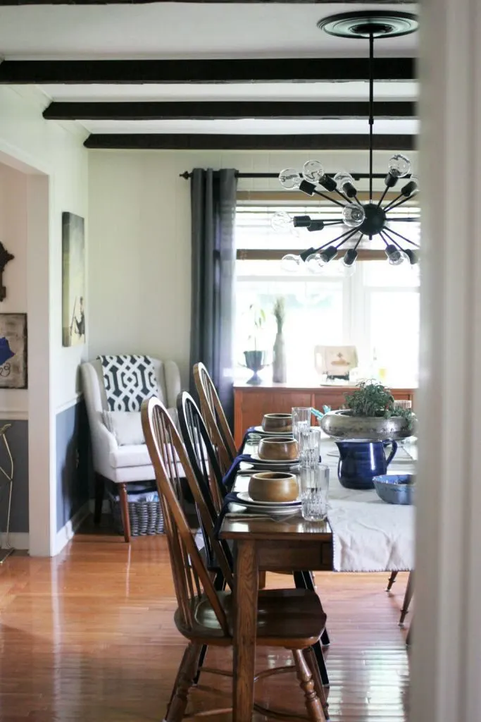 Dining room makeover including grey, white, black and wood tones. Light & Bright Eclectic Home Tour by @CraftivityD