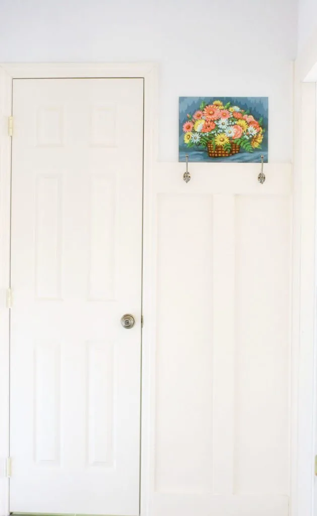 board and batten wall treatment in a mudroom laundry room combo