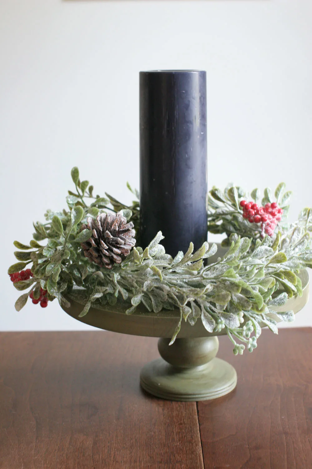 a diy modern advent wreath with a black candle