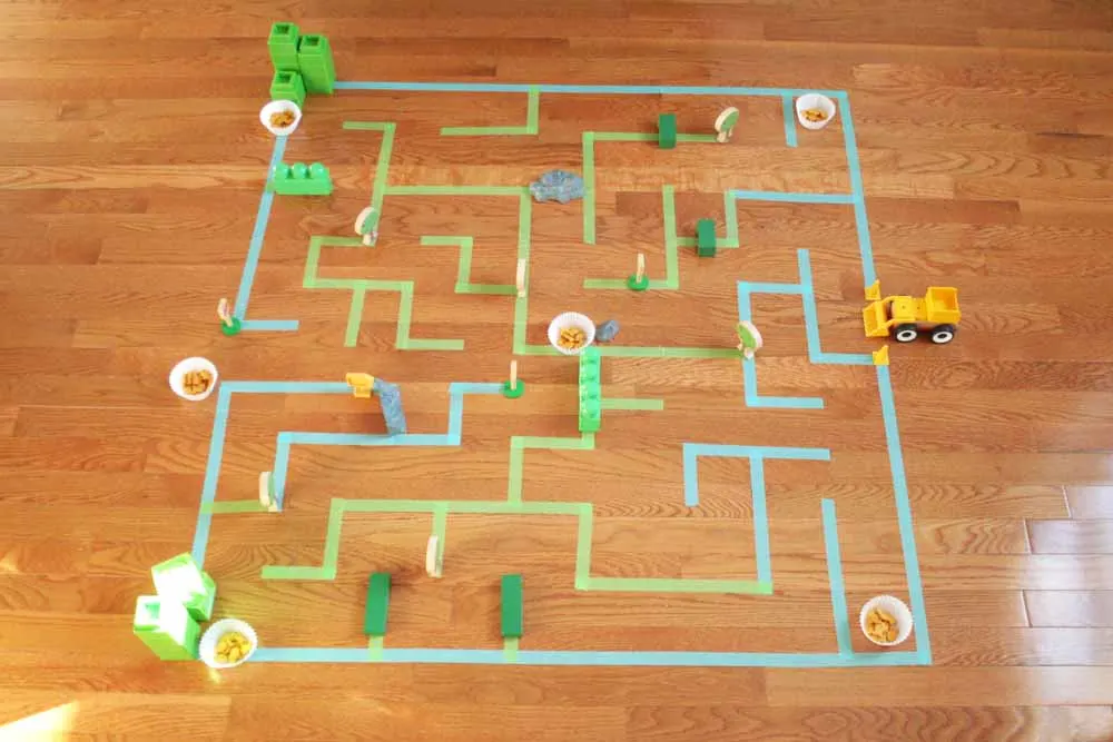 How to make a Giant Floor Maze. This is a great indoor activity for kids that gets them moving and thinking analytically. Click through to get the Giant Floor Maze Template. by @CraftivityD