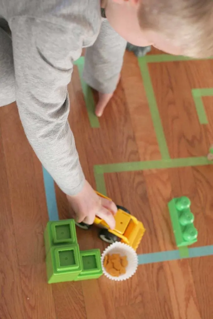 How to make a Giant Floor Maze. This is a great indoor activity for kids that gets them moving and thinking analytically. Click through to get the Giant Floor Maze Template. by @CraftivityD