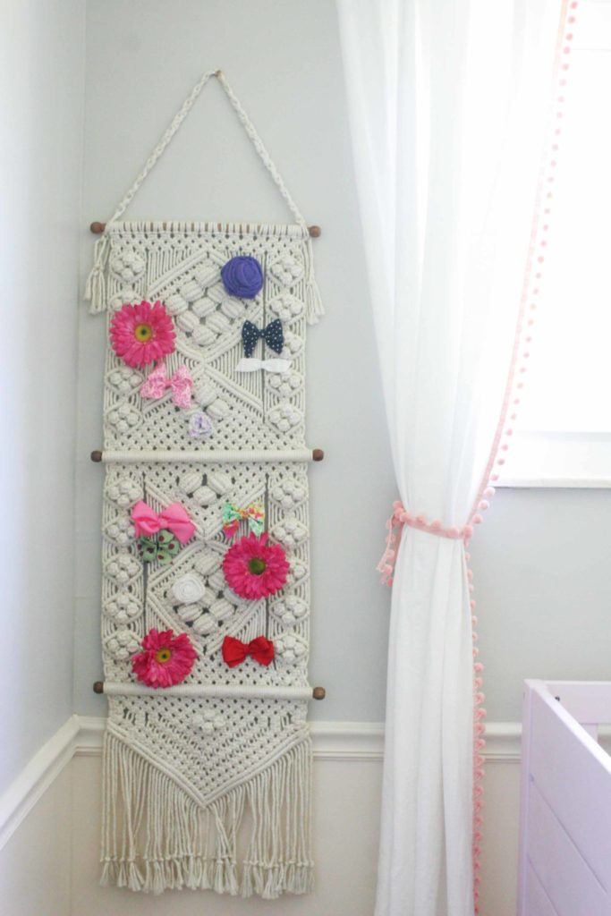 Macrame wall hanging to hold hair bows for nursery on a budget