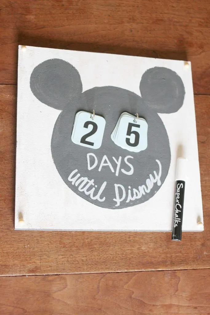 A Disney Countdown Calendar that says "Days until Disney" written in Chalk Marker