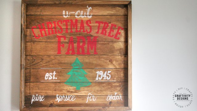 Learn how to make a wooden Christmas Sign to hang in your home. Use the free U-CUT Tree Farm printable as a template for the wood farmhouse sign. #farmhousesign #christmas
