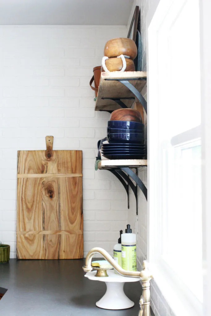 open shelving kitchen brick subway tile