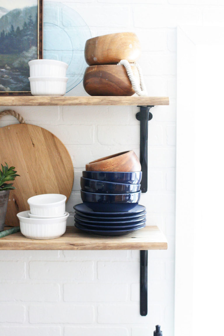 open shelving kitchen with brick subway tile