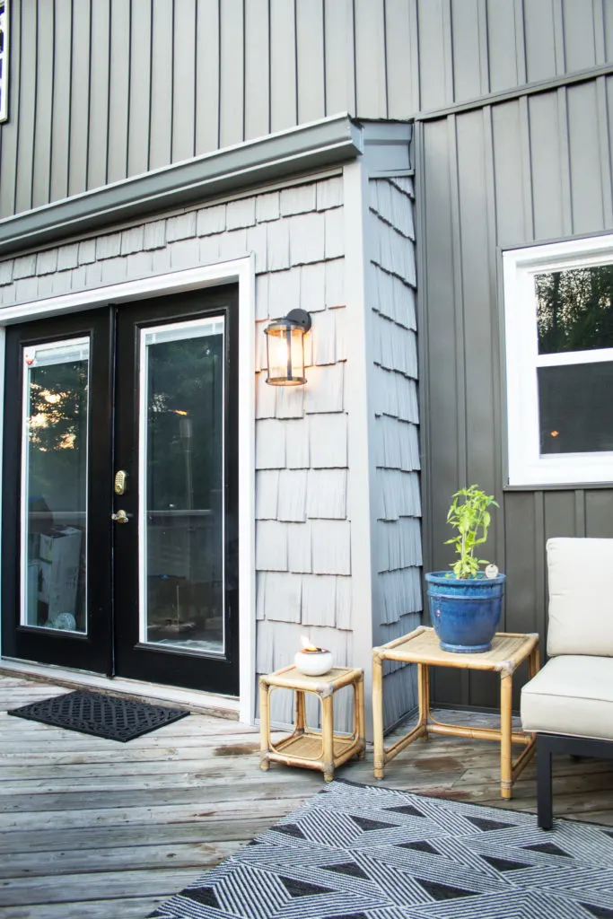 Dark Gray Board and Batten Siding (Vertical Siding), Light Gray Shake Siding, and Outdoor Patio Furniture on a Deck