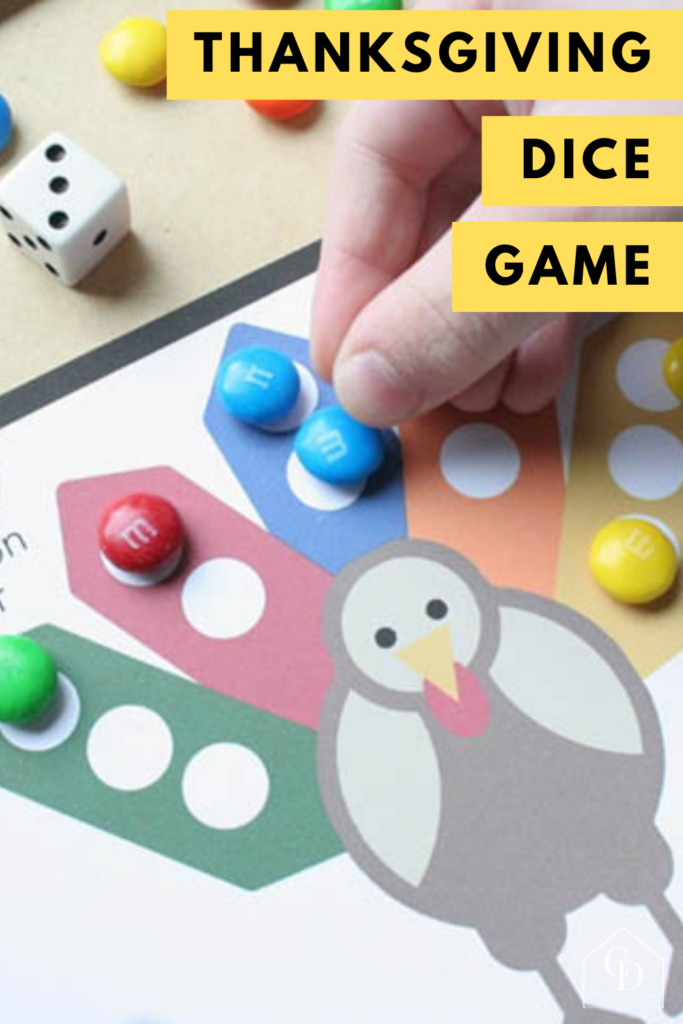 Free Printable Thanksgiving Dice Game for Kids played with M&Ms