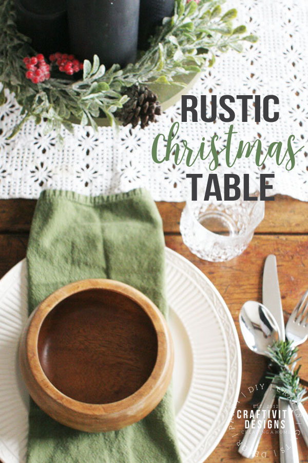 rustic christmas table setting with lace runner and christmas centerpiece