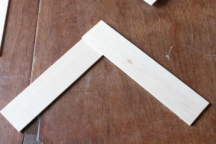 glue two pieces of balsa wood together