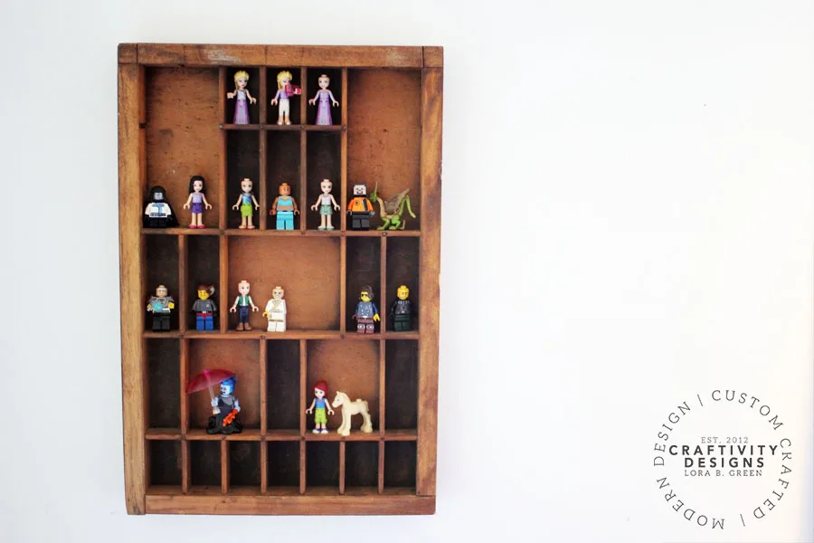 Display LEGO® Minifigures in a Vintage Printers Tray to organize small toys