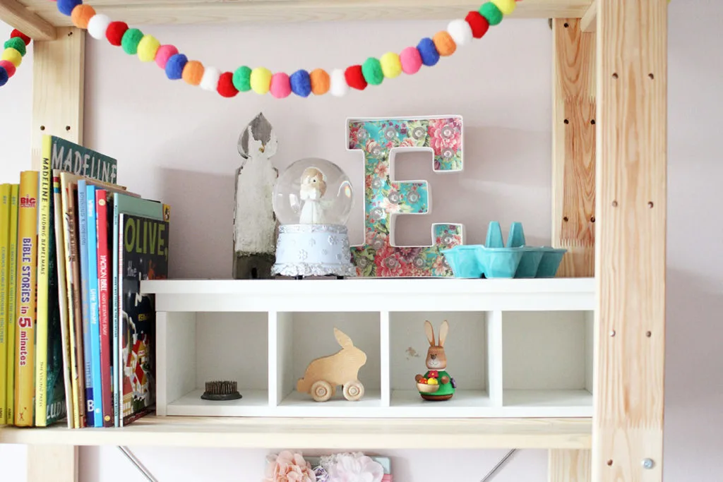 A wood bookshelf with colorful pom poms - little girl bedroom ideas - by Craftivity Designs