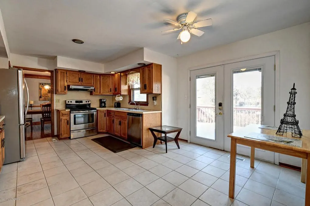 Before a Budget Kitchen Remodel, with Wood Cabinets, White Tile