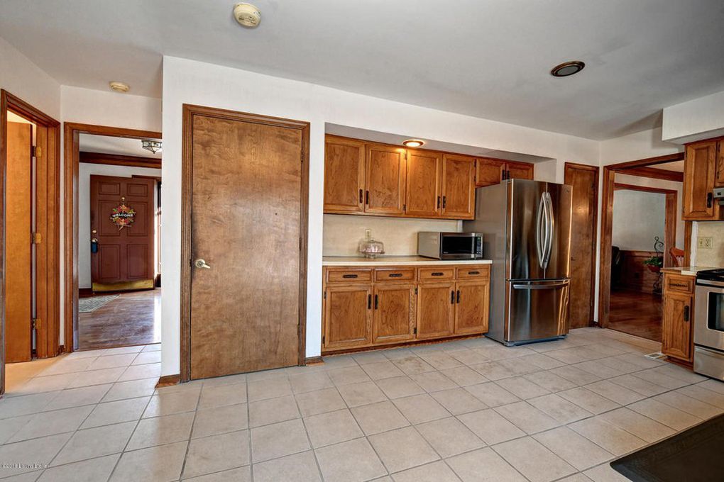 Before a Budget Kitchen Remodel, with Wood Cabinets, White Tile