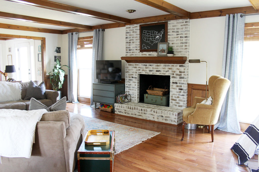 Living Room After Modern Cottage Remodel, Dark Beams, White Walls, and German Schmear Brick Fireplace, by Craftivity Designs