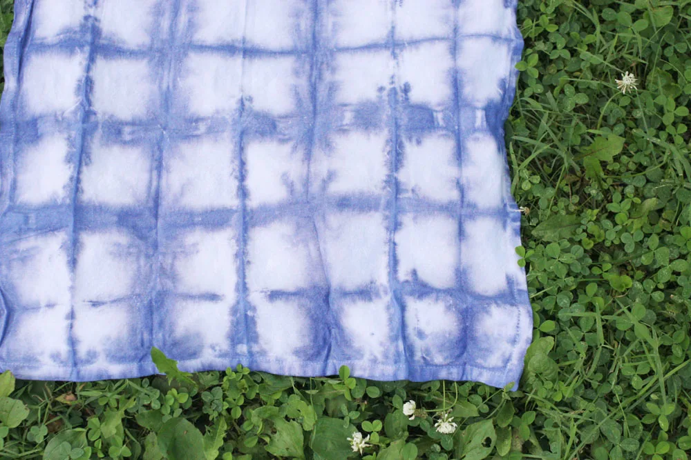 Shibori Cloth Napkin drying on grass