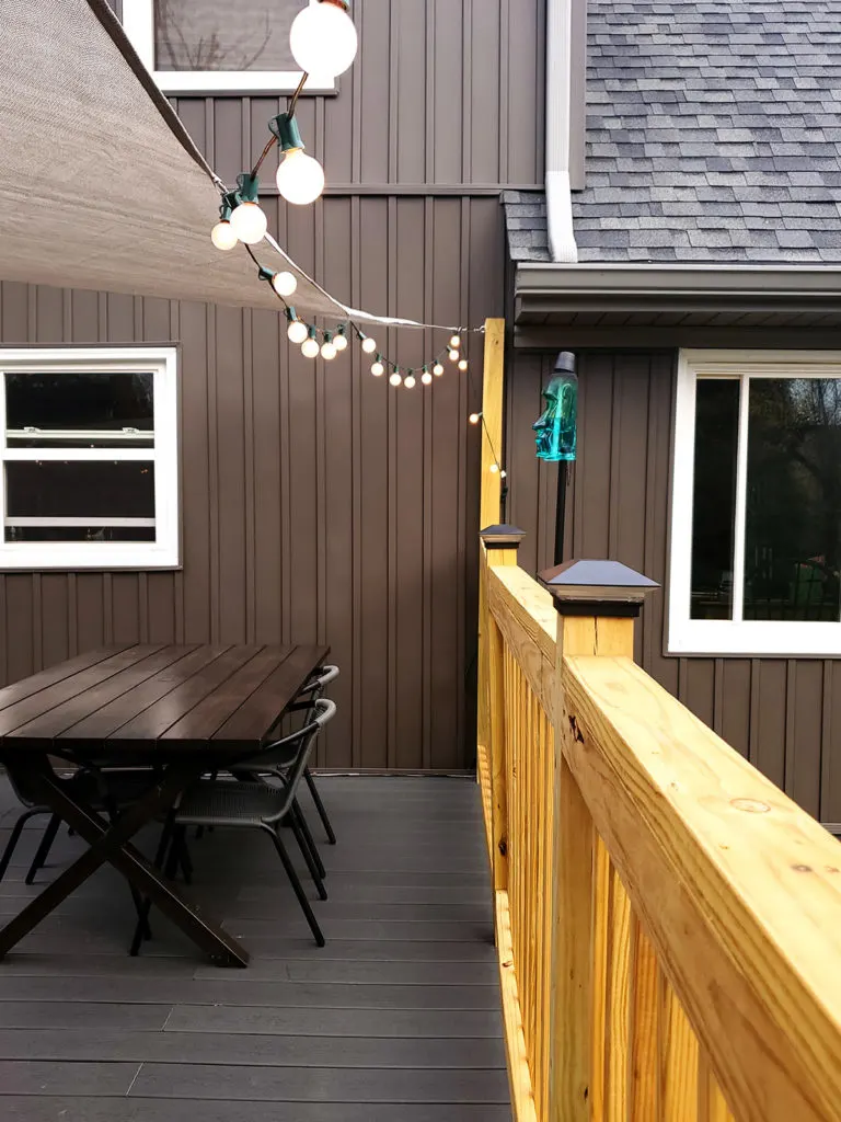 How to Install a Shade Sail, Shade sail with Patio Lights over a deck on a Modern Home