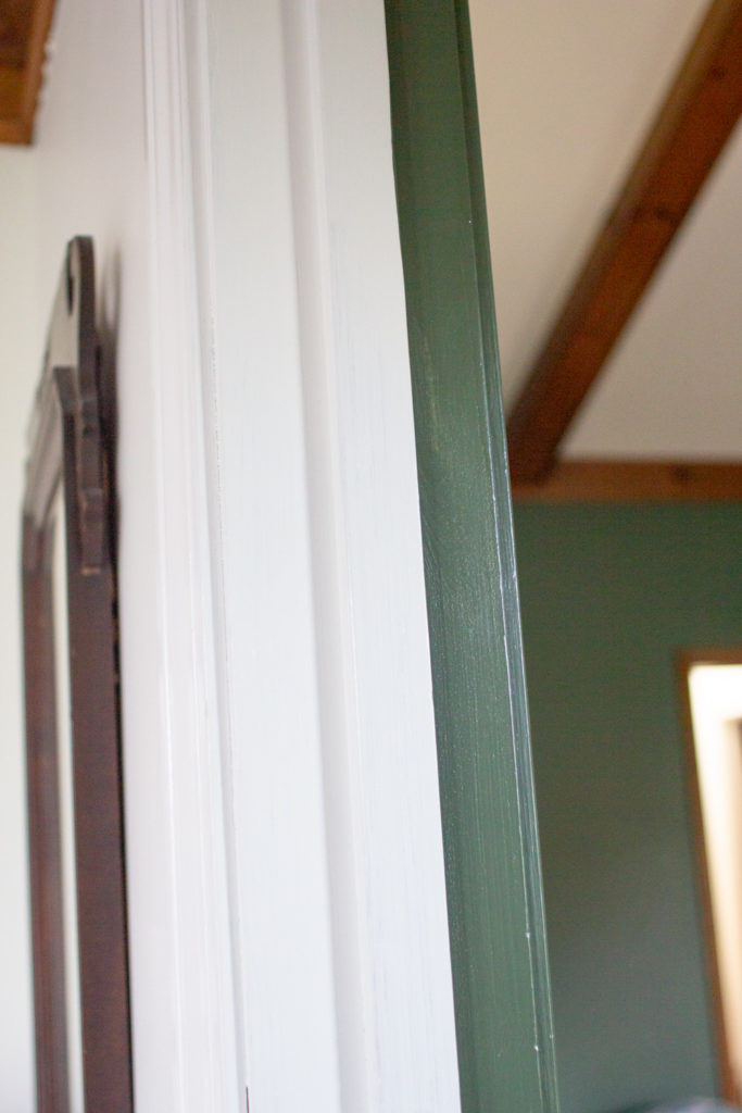 white trim and painted trim in doorway