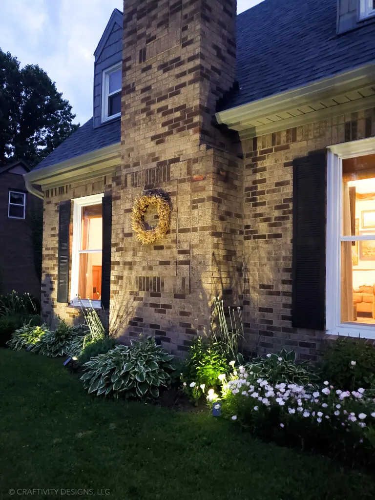 solar landscape lighting - solar spotlights on chimney