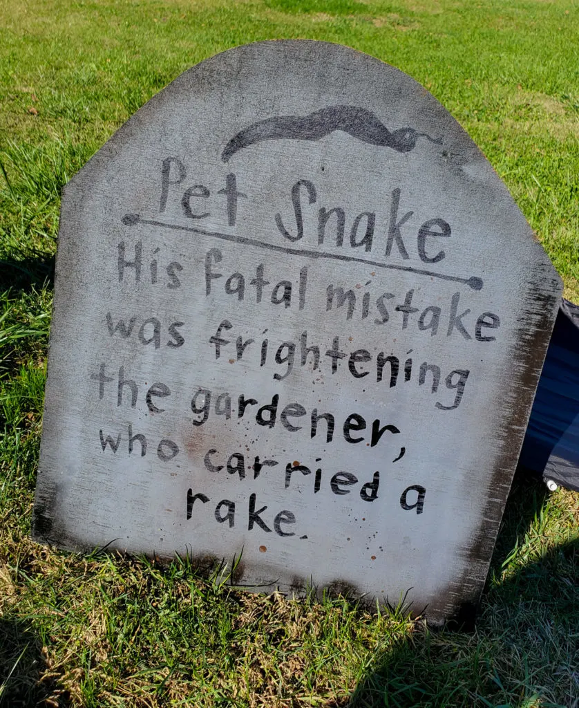 tombstone saying - pet snake his fatal mistake was frightening the gardener who carried a rake