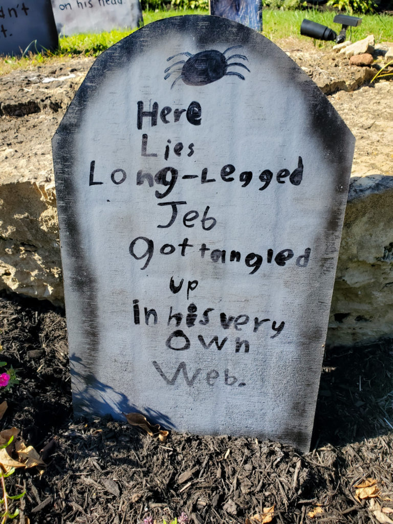 tombstone saying - here lies long legged jeb got tangled up in his very own web