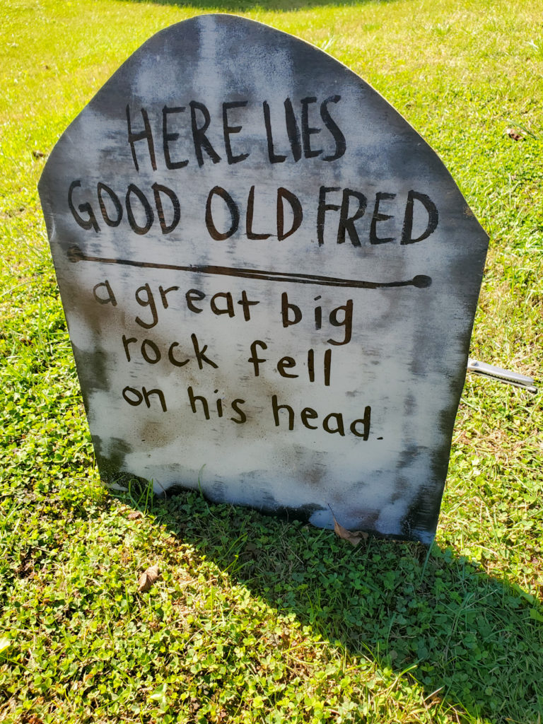 tombstone saying - here lies good old fred a great big rock fell on his head