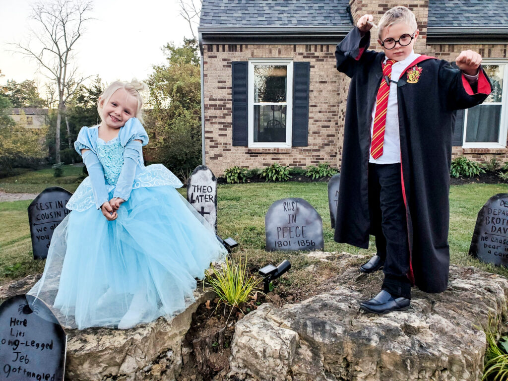 halloween tombstones with cinderella and harry potter costumes