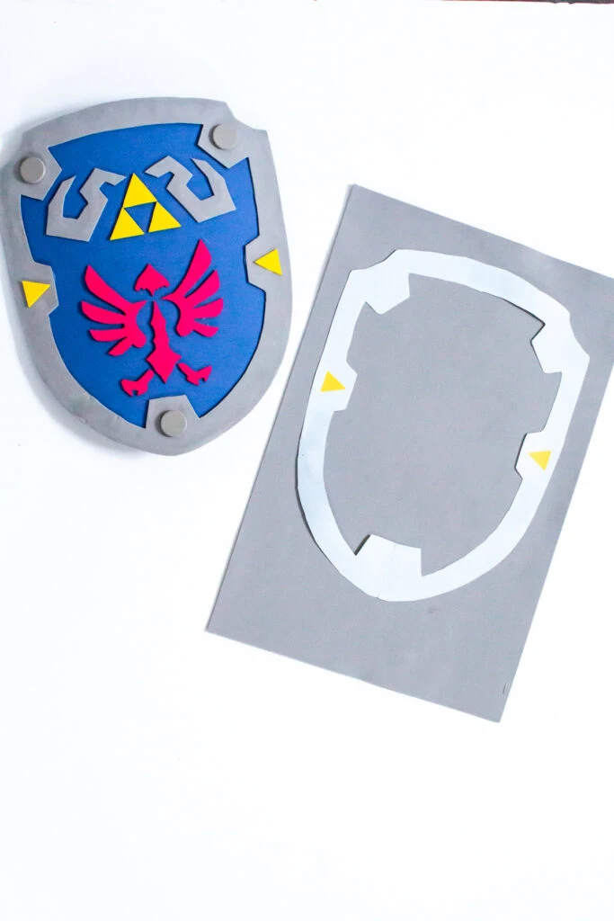 diy hylian shield with printable template, cut frame from gray foam