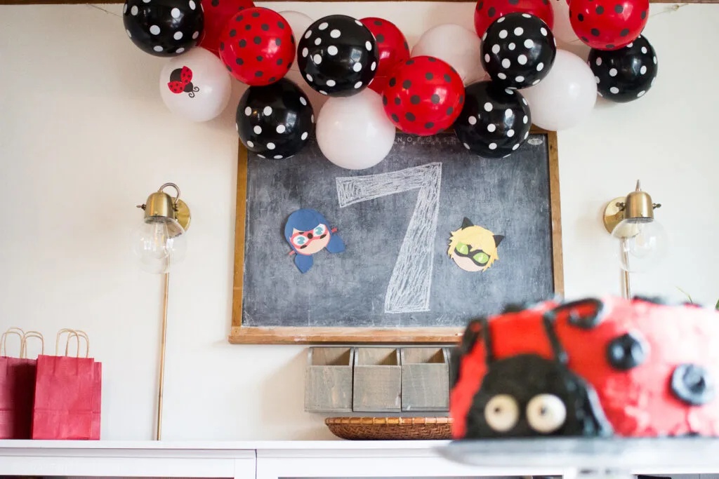 Ladybug and Cat Noir Birthday Party - Easy Party Decorations with Ladybug Cake and Balloon Banner