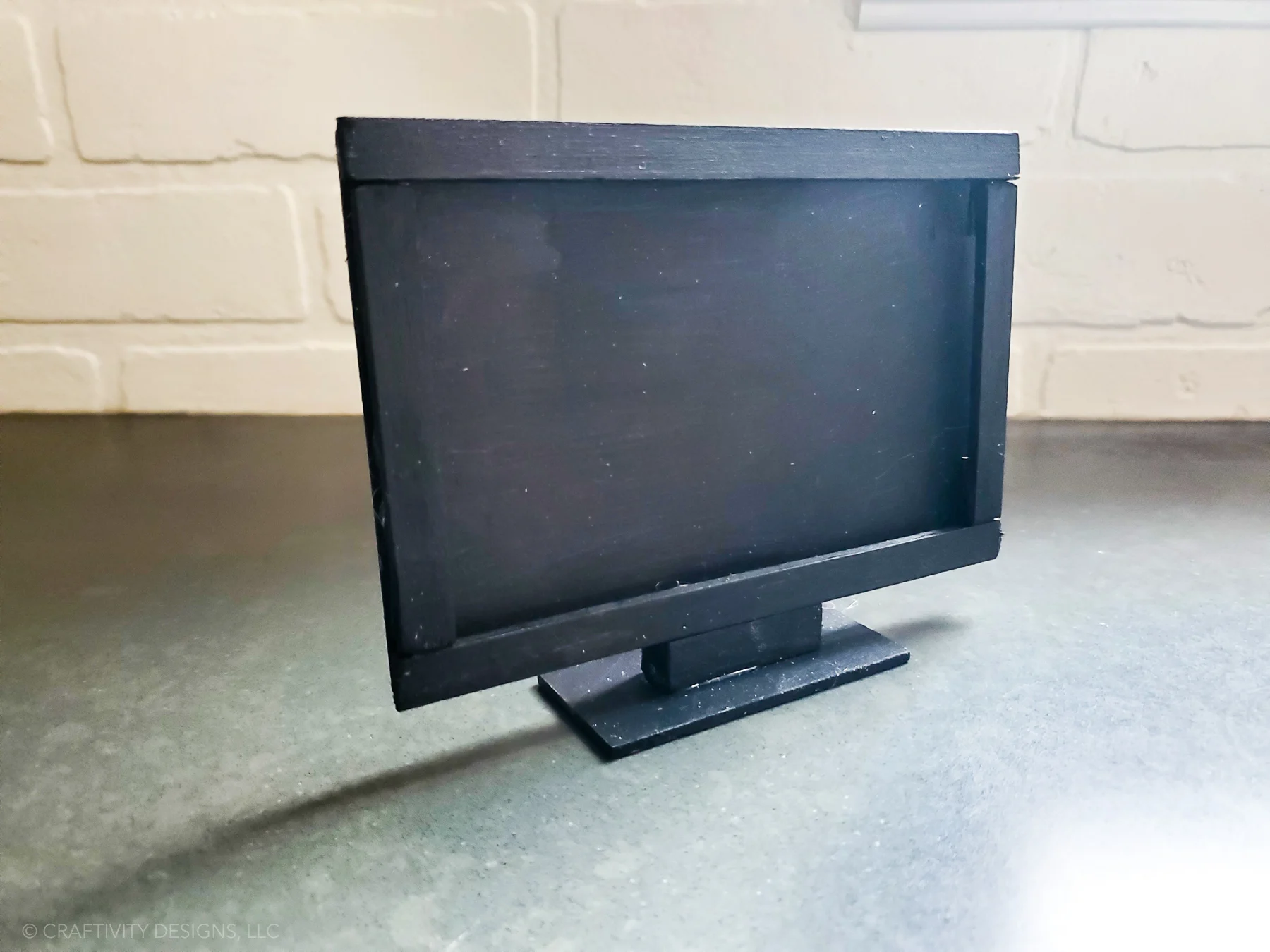 attach tv frame to tv stand
