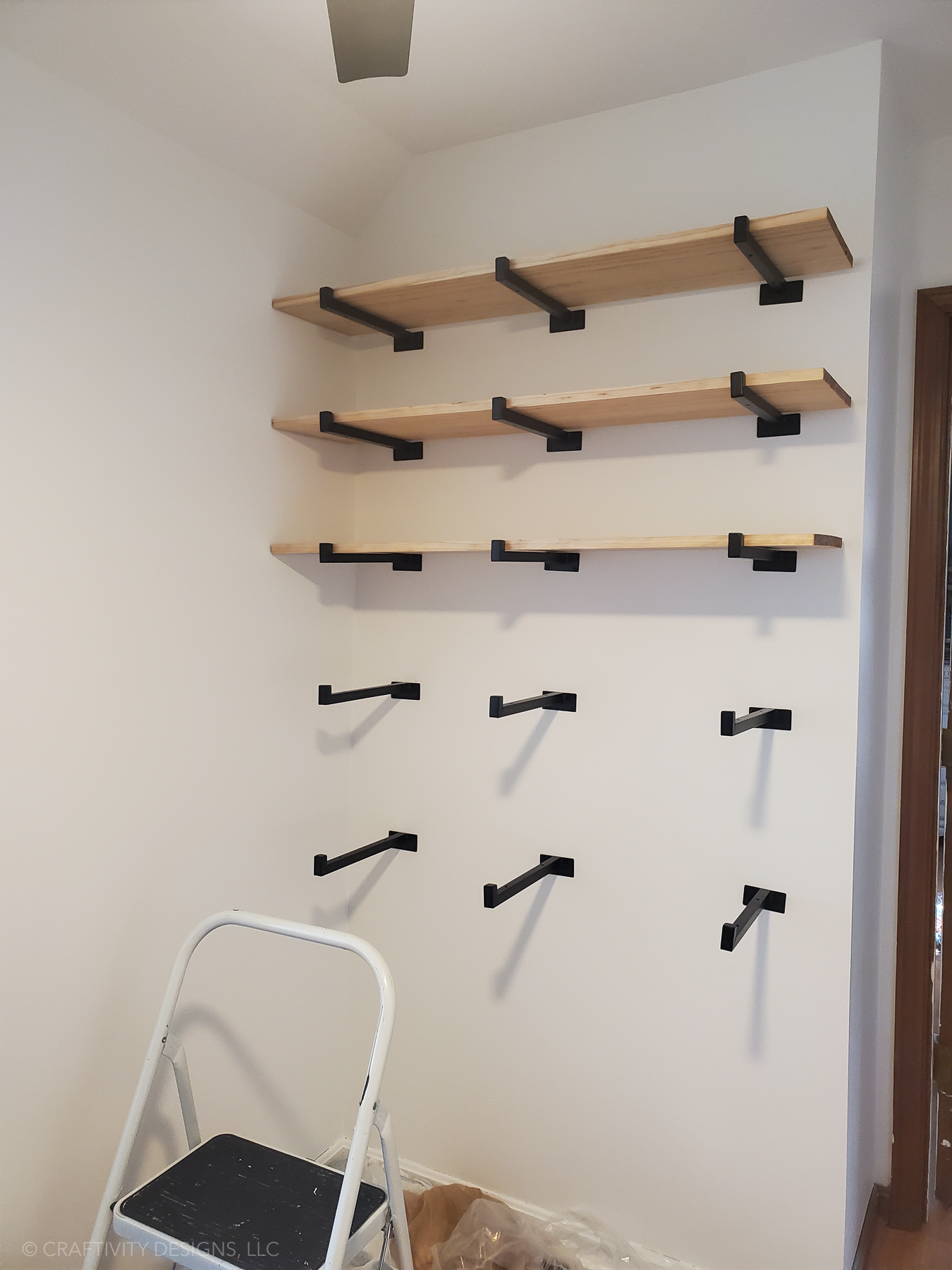 work from top to bottom when installing heavy duty shelf brackets for wall shelves for books