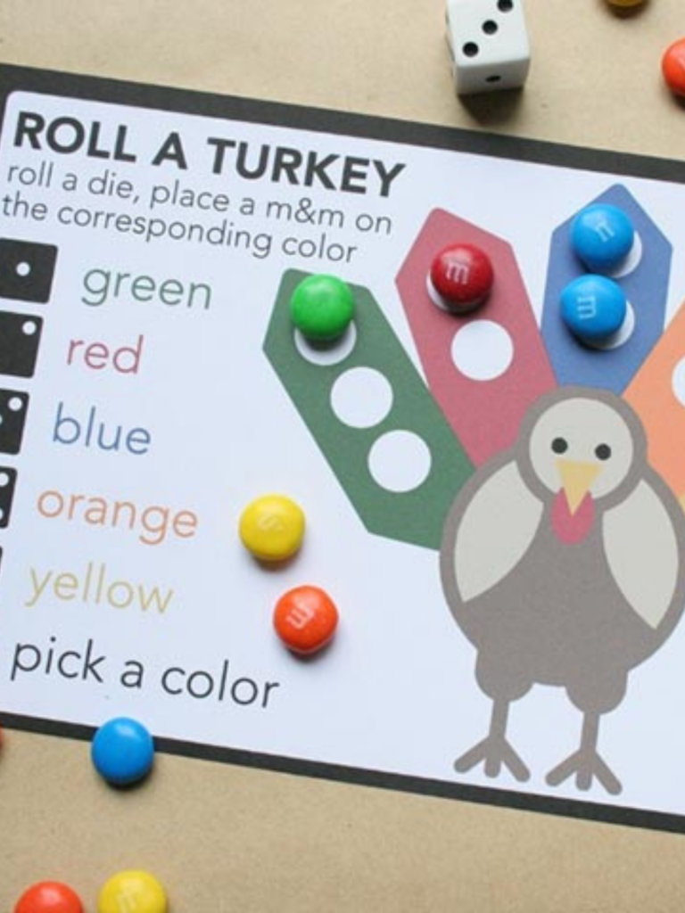Free Printable Thanksgiving Dice Game for Kids played with M&Ms