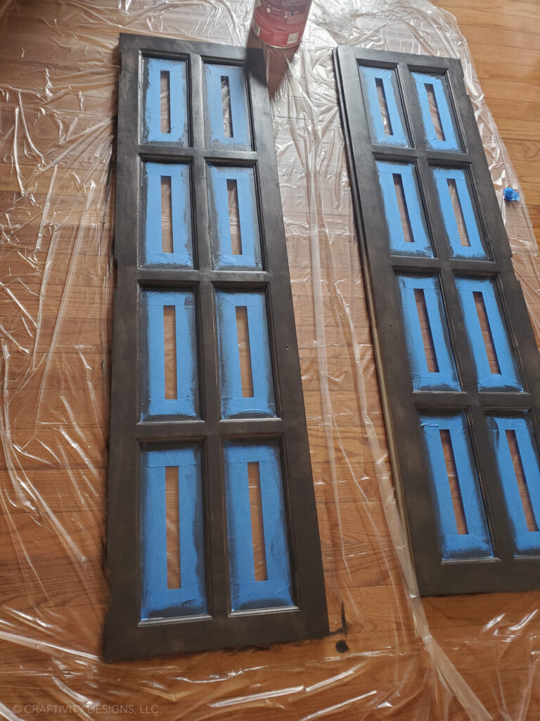 Black Display Cabinet Makeover, prep glass doors with painter's tape