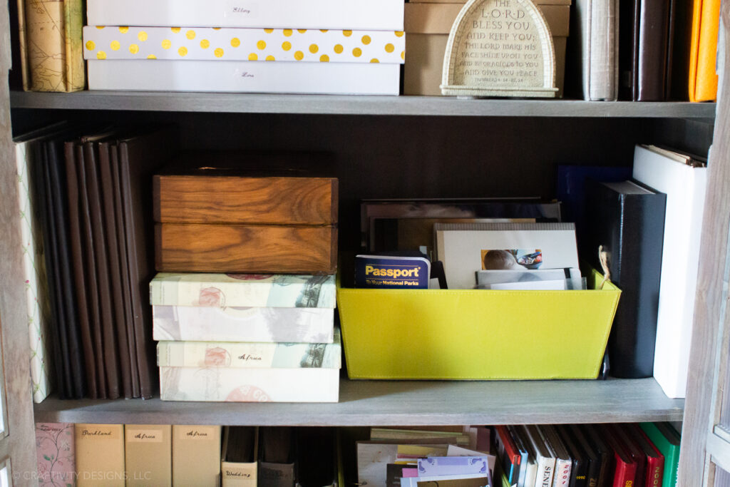 Photo storage ideas in a family cabinet.