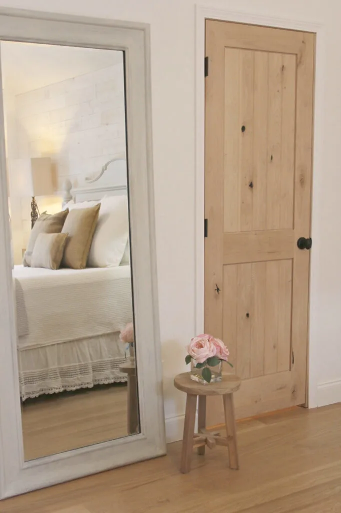 light wood door with white trim