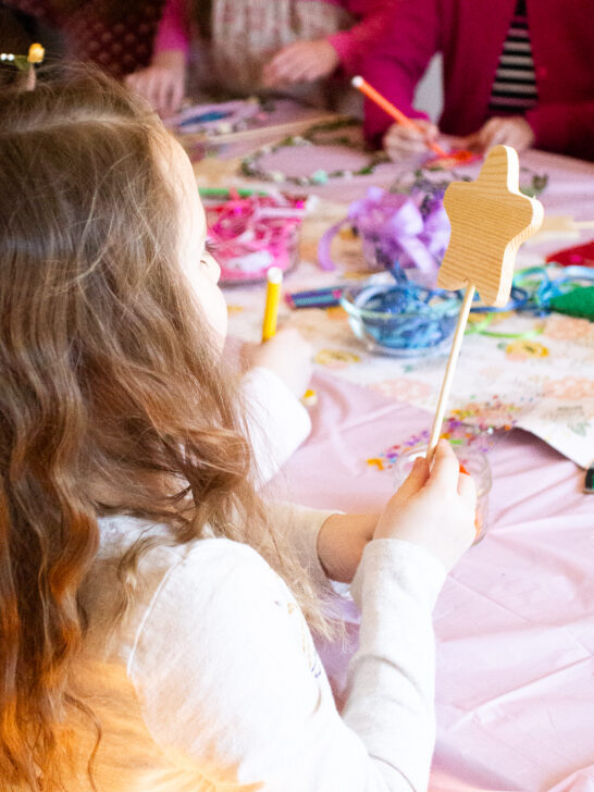 child completing fairy crafts at a fairy birthday party