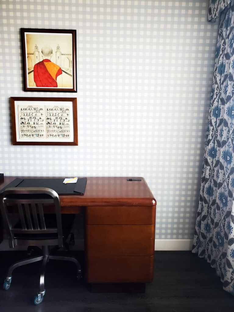 guest room graduate bloomington review, check wallpaper with eclectic artwork