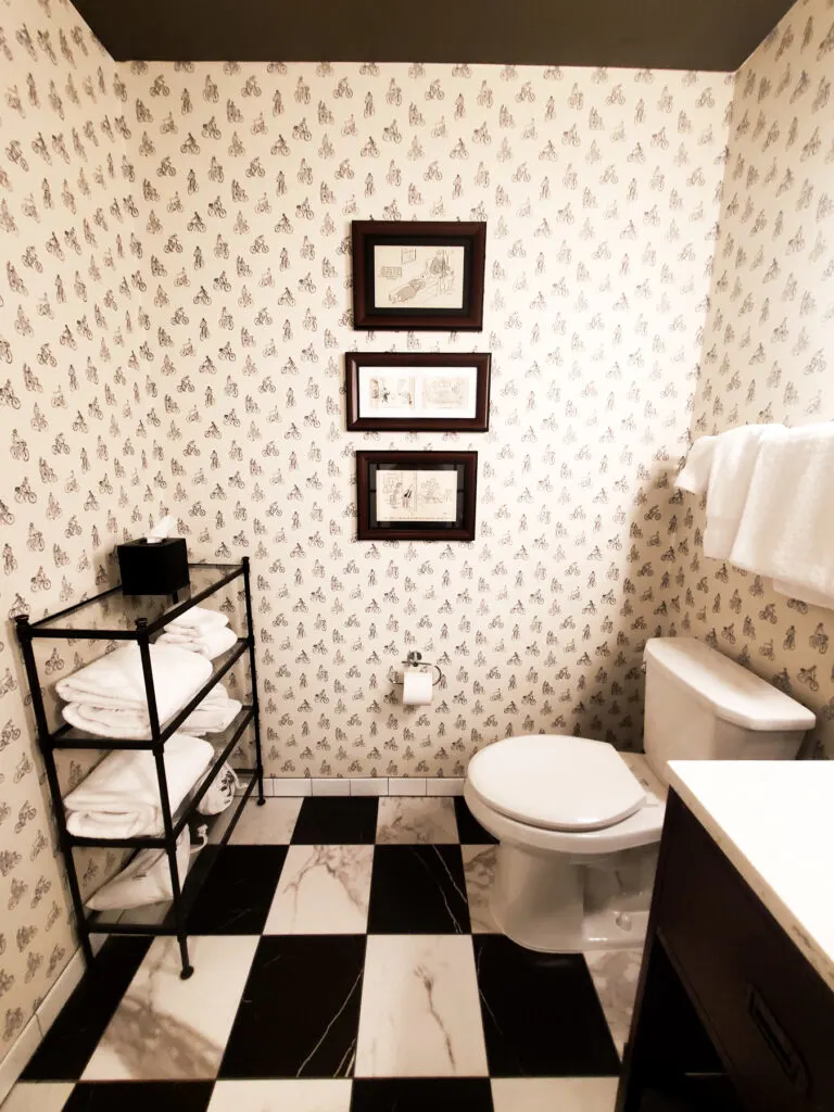 black and white guest room bath graduate bloomington review, with bicycle wallpaper